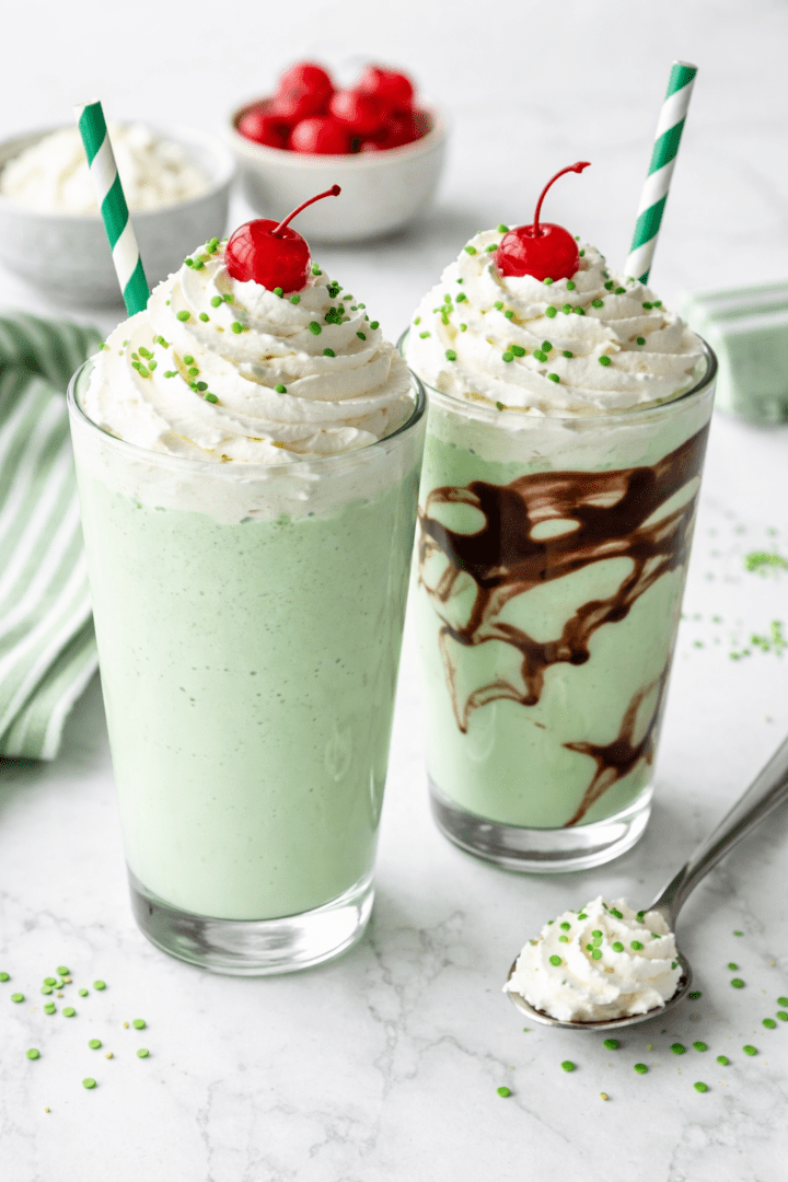 Shamrock shakes with toppings and treats